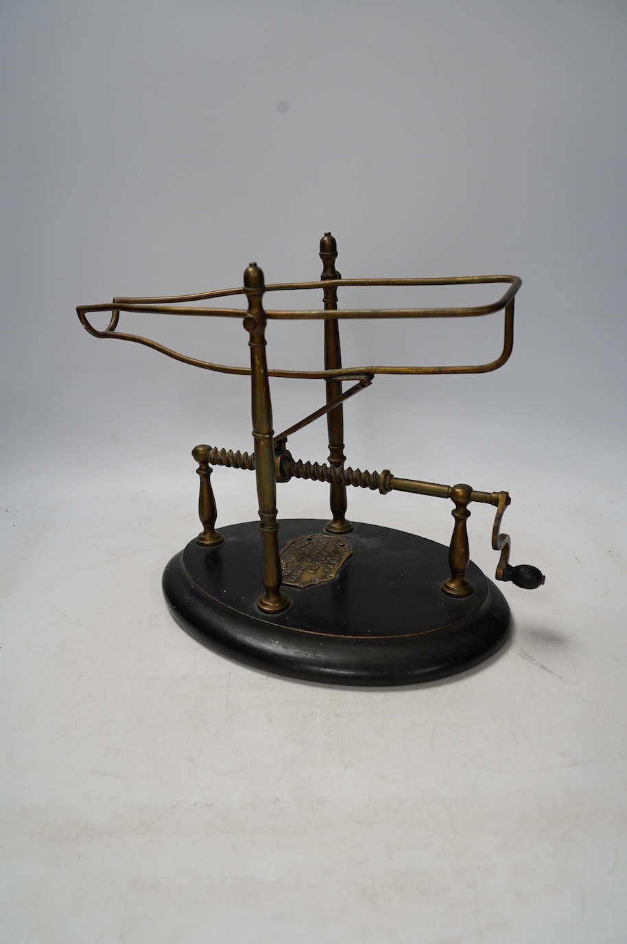 A Victorian Farrow & Jackson of London and Paris wine cradle or decanting machine, 32cm. Condition - fair to good